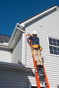 Louisville Type IA Fiberglass Extension Ladder - In Use