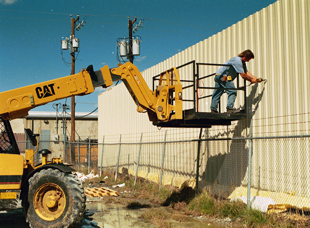 1205 Star Industries Safety Work Platform for Forklifts OSHA compliant aerial work cage in use on jobsite